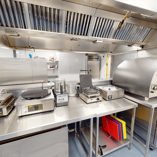 Clean commercial kitchen ready for strip out